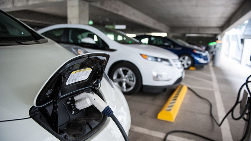 A Nissan Leaf and Chevrolet Volt charging in a U.S. federal building garage