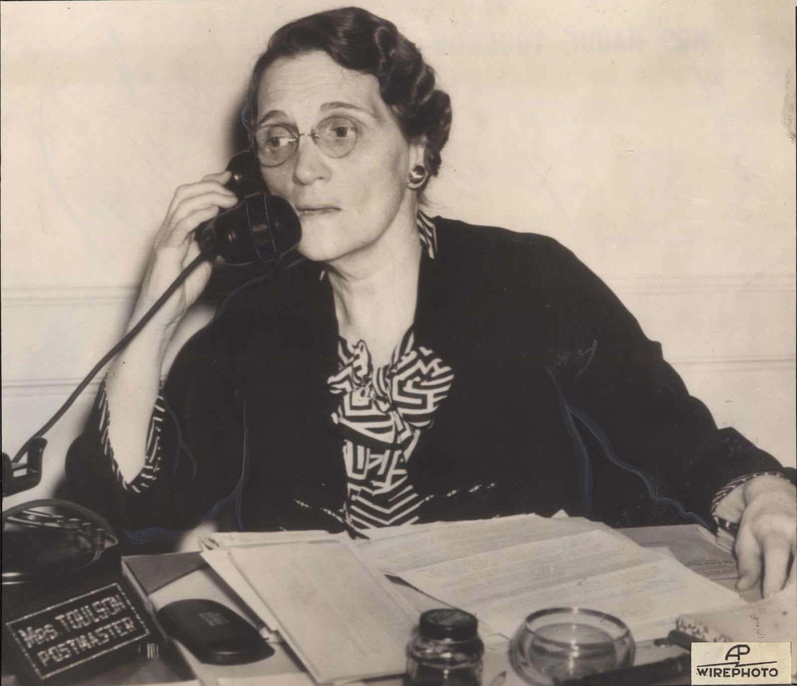 Photo of Maude R. Toulson on the phone