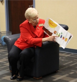 Sandra Deal reads to children at KIDazzle Child Care Center as part of 