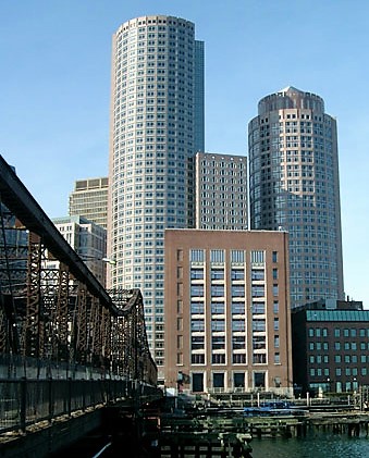 williams building with two towers behind it and a bridge to the left of the photo