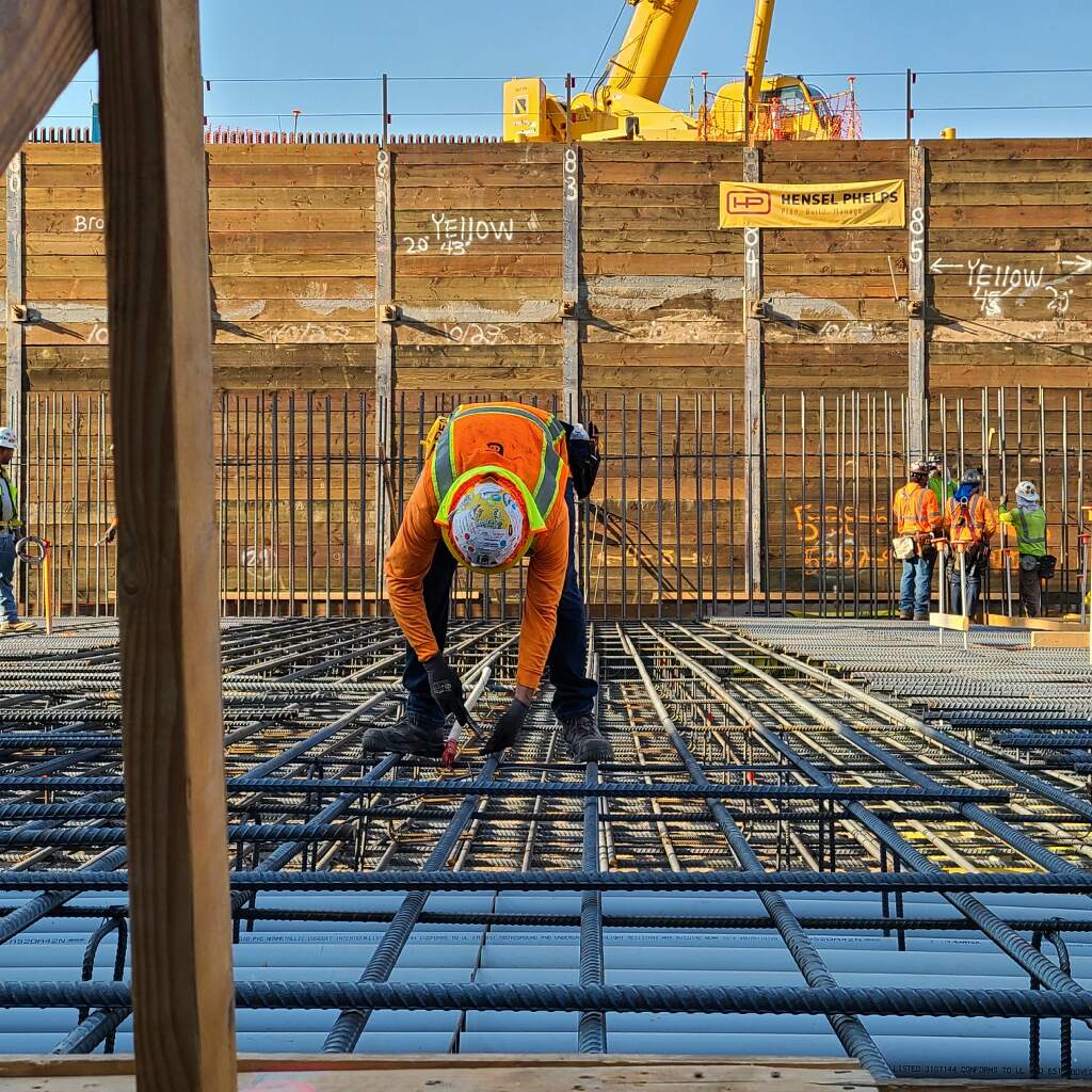 A construction worker installs rebar at the Calexico Land Port of Entry