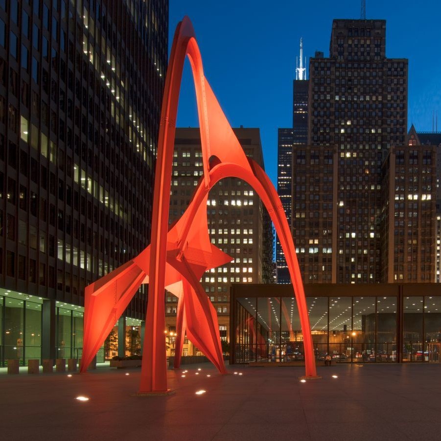 Full night shot of Calder Flamingo sculpture on Chicago Federal Plaza