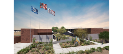 Douglas LPOE exterior featuring the US flag, CBP flag, and POW/MIA flag, with native desert plants in the landscaping.
