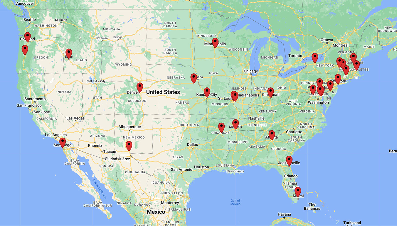U.S. map with red pins showing 32 EV charger port project locations