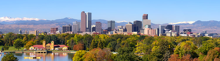 Denver cityscape with Rocky Mountains in background