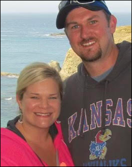 Sommer pictured with her husband and a tropical background.