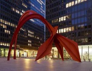 Exterior lighted night time image of the Calder F