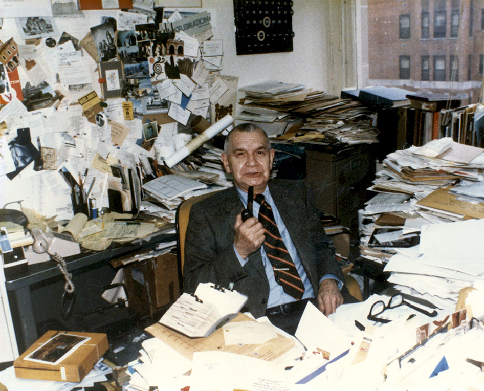 Karel Yasko sitting at his desk in his office on the 3rd floor at GSA Headquarters