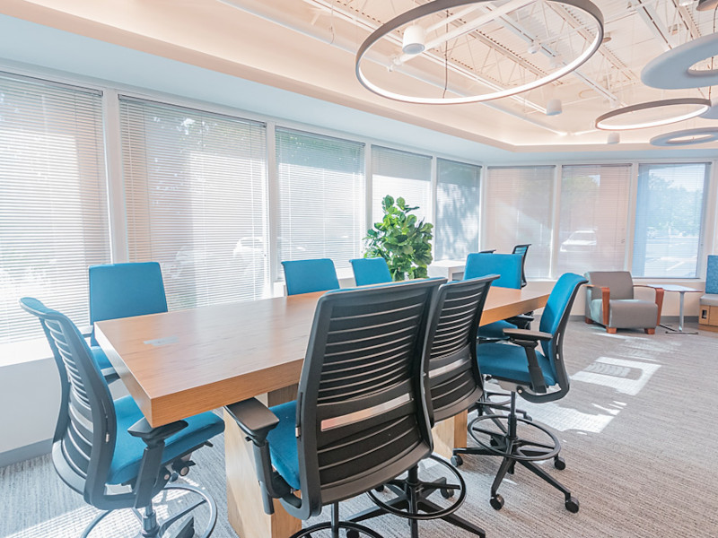 A modern conference room with abundant natural light.