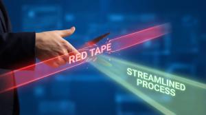 Man cutting virtual red tape