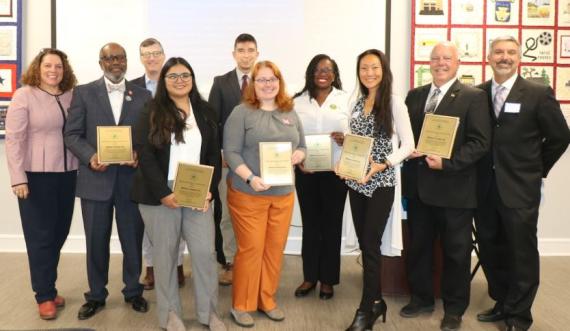 Regional Administrator Thomas poses with a group of people at the EPA Excellence in Site Reuse Awards ceremony