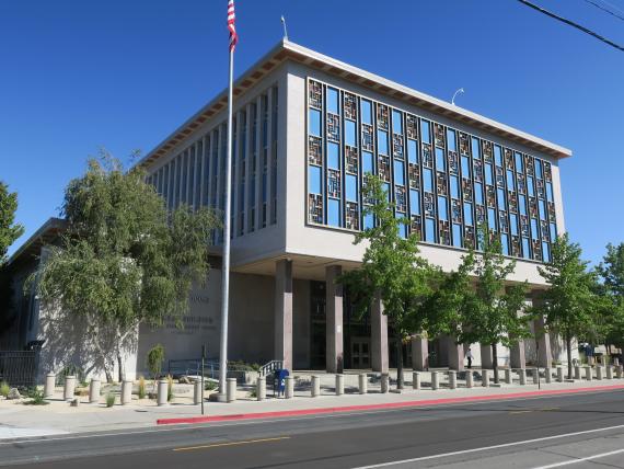 The C. Clifton Young Federal Building and U.S. Courthouse at 300 Booth St. in Reno, Nevada is shown.