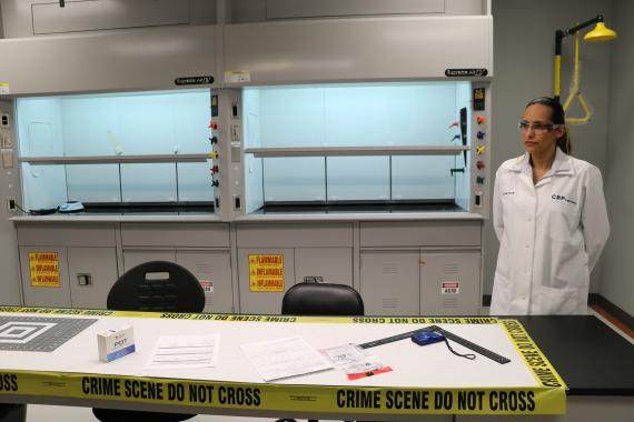 Nydia Natal, CBP San Juan Laboratory employee, displays some tools inside the new San Juan Laboratory