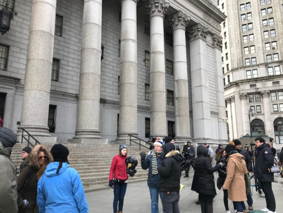 Photo of production crew preparing for a shoot outside of the Thurgood Marshall U.S. Courthouse in Lower Manhattan.