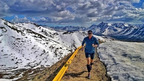 Tom Deakins takes in a ridge line trail near Anchorage.