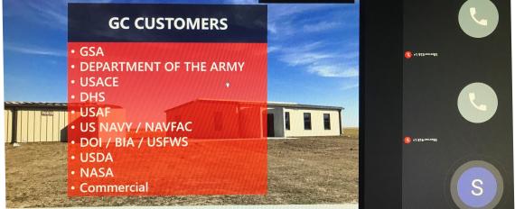 A computer screen with a virtual meeting room and a slide showing a list of GC customers being federal agencies.