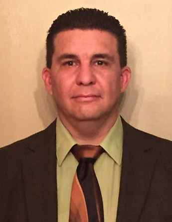 Color blended photo of person in suit and tie.