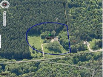 aerial view of the property with it circled