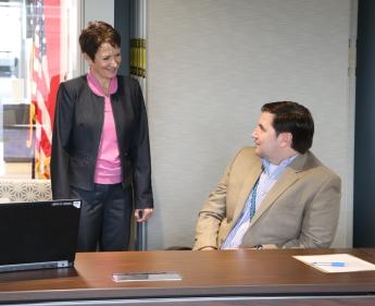 Mary Ruwwe and Brantt Lindsey chat during the KC Acquisition Forum on Oct. 23.