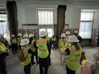 Long view of Frank E. Moss U.S. Courthouse tour by Erin Holcombe (far center), Region 8 project manager, to the Commercial Real 