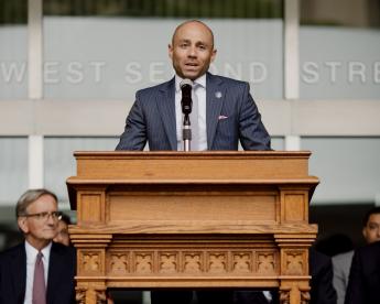 Medium shot of GSA Great Lakes Regional Administrator Brad Hansher speaking at the Sept. 6 naming ceremony for the Walter H. Rice Federal Building and U.S. Courthouse.