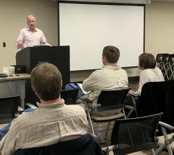 Tim Horne speaks to VOSB reps at matchmaking event.