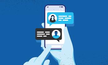 Illustration of two hands holding a mobile phone with a conversation on the screen
