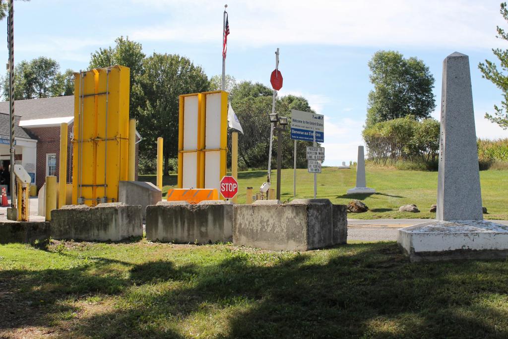 The alburg springs building with the mile marker on the right hand side