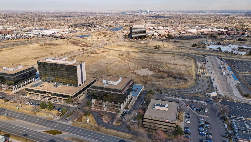 8 Looking east Union Blvd businesses in the foreground. a view of the Property the Denver Federal Center to the east of the Prop