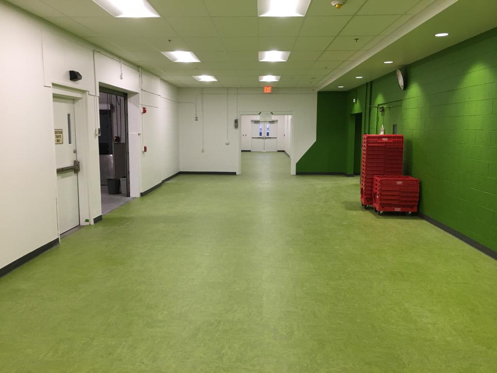 Green painted wall on the exit corridor in Bannister Federal Complex.
