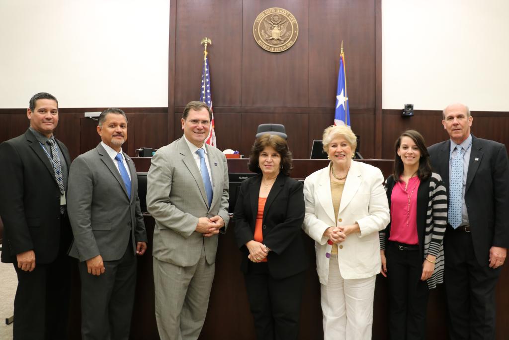 Regional Administrator John A. Sarcone III poses for a photo with GSA employees and leaders from the U.S. District Court of PR