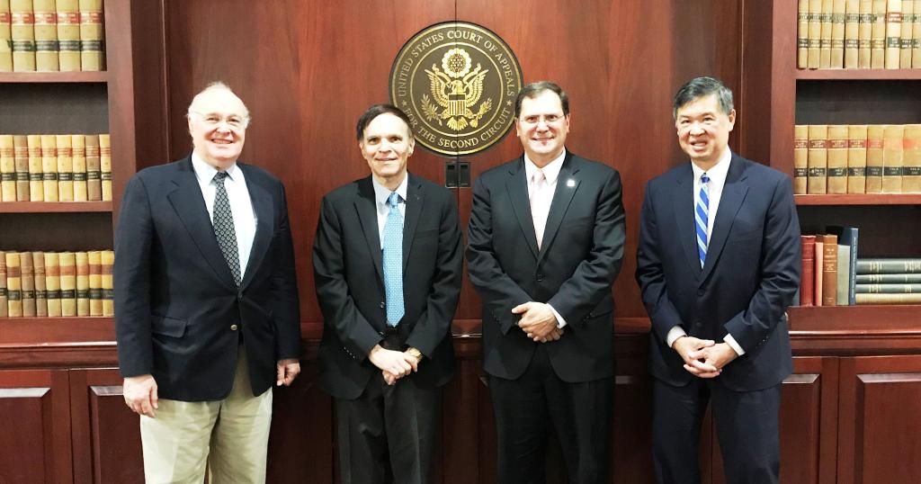 Regional Administrator John A. Sarcone III, GSA's Northeast and Caribbean Region (second from right), poses for a photo with Jud