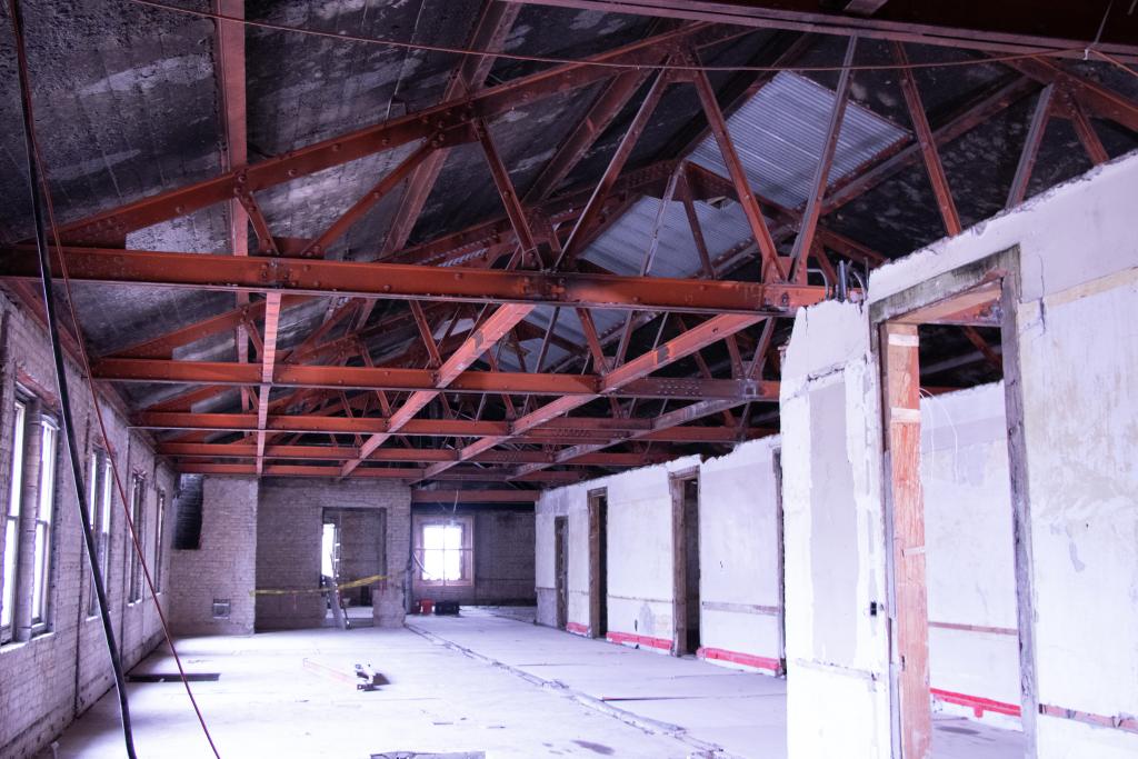 Inside the Moss Modernization project where all the walls and floors have been striped down.