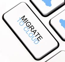 Image of keyboard with text saying Migrate to Cloud