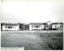 1956 photo of the lpoe showcasing previously demolished residences in the background